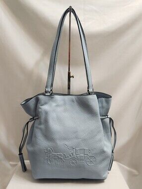 Coach Andy Horse And Carriage Logo Drawstring Pebble Leather Light Blue Tote